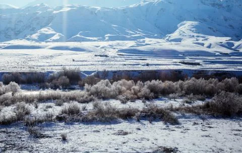 Snowy landscape from the train window Stock Photos