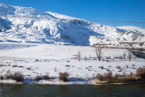 Snowy landscape from the train window Stock Photos