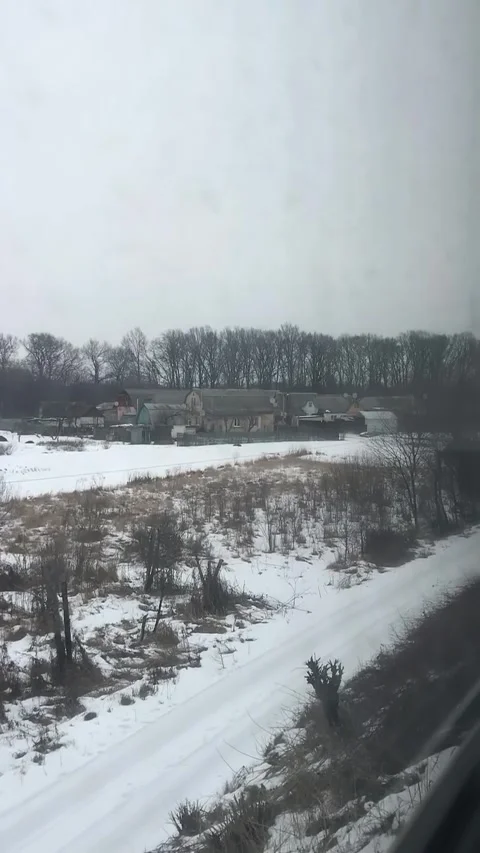 Snowy Landscape Viewed from Moving Train in Winter Stock Footage 338126281