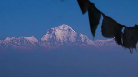 Snowy mountain and prayer flags Stock Footage 247199117