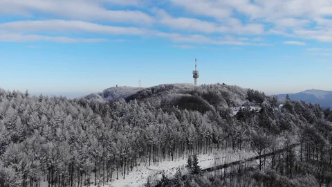 Snowy mountain approaching dron view Stock Footage