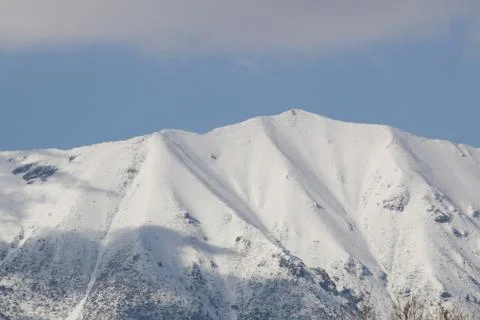 The snowy mountain beyond Stock Photos