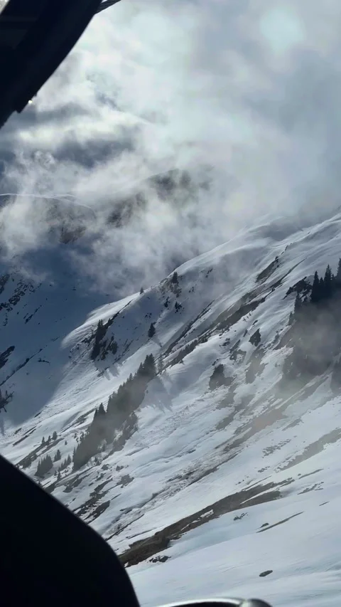 Snowy Mountain Landscape Under Dramatic Clouds in Austrian Alps (Portrait View) Stock Footage 285071962