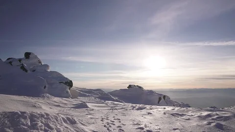 Snowy Mountain Peak Sunset Timelapse 4K Stock Footage 76516724