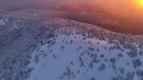 Snowy Mountain Peak Winter Orbit Hikers Stock Footage 336278048