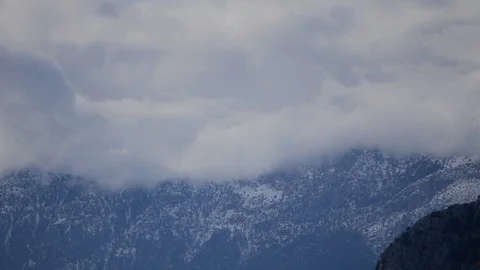 Snowy mountain peaks in spring Stock Footage 88866011