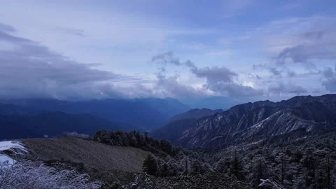 Snowy Mountain Peaks Under Moving Clouds in Western Sichuan Plateau Landscape Stock Footage 342017526