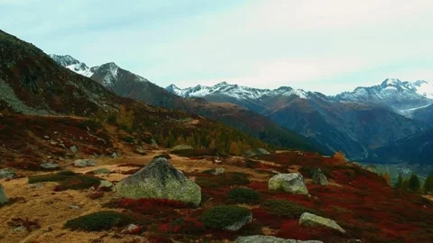 Snowy mountain range, alpine valley drone, cinematic mountain view Stock Footage 311762746