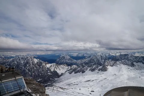 Snowy Mountain Range View from Summit Platform under Cloudy Sky Stock Photos