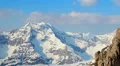 Snowy mountain ridge panorama, bright blue sky in Austrian Alps HD Footage