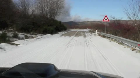 Snowy mountain road Stock Footage 66429629