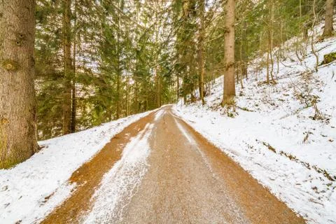 Snowy mountain road Stock Photos
