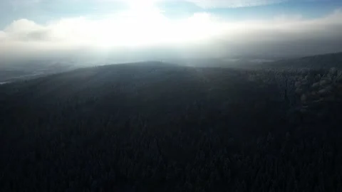 Snowy mountain with ski slope, trees and beautiful sky in winter Stock Footage 226366111