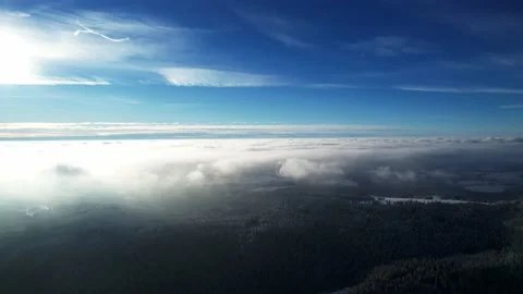 Snowy mountain with ski slope, trees and beautiful sky in winter Stock Footage 226366479