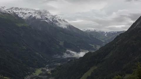 Snowy mountain timelapse Stock Footage 233469749