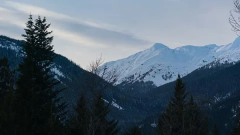 Snowy mountain timelapse Stock Footage 237714051