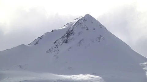 Snowy Mountain Top With Shadows Stock Footage 77135336
