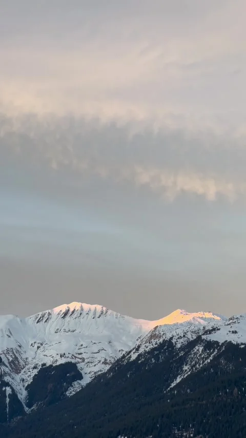 Snowy Mountain View under the cloudy sky Stock Footage 334404253