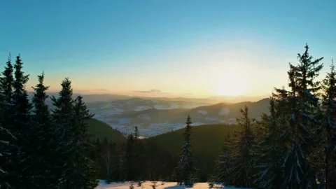 Snowy mountain view, winter forest sunrise, cinematic snow landscape Stock Footage 312198671