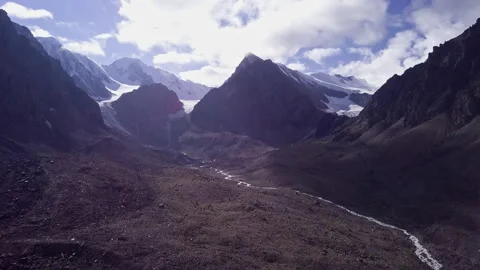 Snowy mountains and sky Stock Footage 163389313
