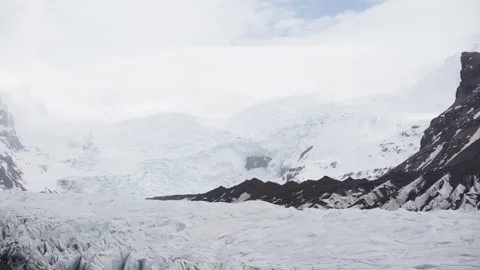 Snowy mountains on cloudy day Stock Footage 196623988