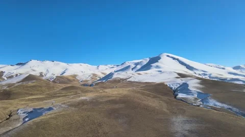Snowy mountains drone shot Stock Footage 237153159