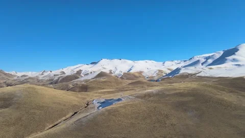 Snowy mountains drone shot Stock Footage 237153237