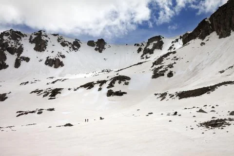 Snowy mountains at evening Stock Photos