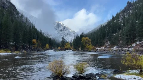 Snowy mountains in fall and beautiful river Stock Footage 221209643