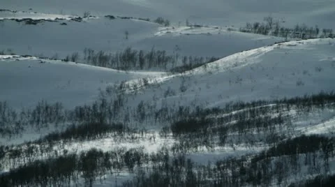 Snowy mountains with nice backlight Stock Footage 12135915
