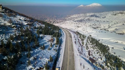 Snowy mountains roads pine forests and magnificent scenery Stock Footage 294187475