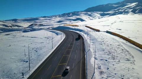 Snowy mountains roads pine forests and magnificent scenery Stock Footage 294197697