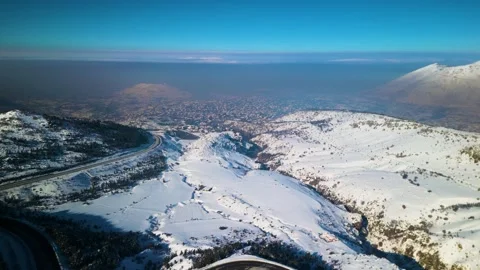 Snowy mountains roads pine forests and magnificent scenery 動画素材 294218342