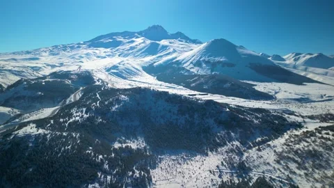 Snowy mountains roads pine forests and magnificent scenery 動画素材 294221830