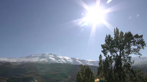 Snowy mountains with sun Video stock 5503279