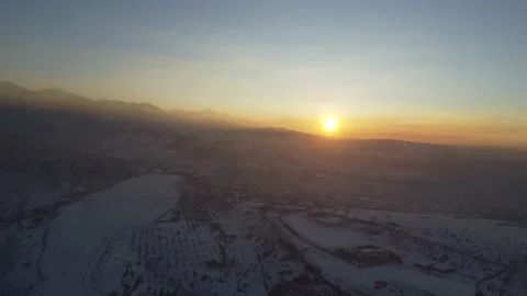 Snowy mountains at sunset Stock Footage 231097431