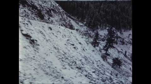 Snowy Mountainside as seen from Train Stock Footage 47524960