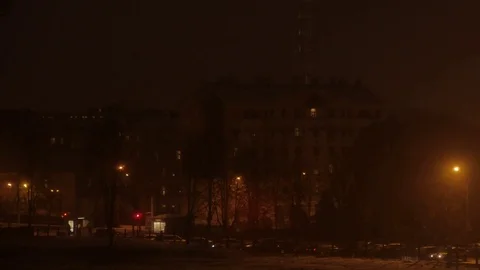 Snowy night in the light of the lanterns. Blizzard and heavy snowfall. Christmas Stock Footage 72790427