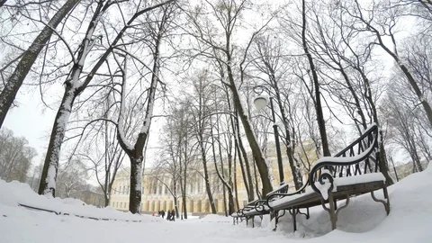 Snowy path in the city park. Mikhailovsky Garden, St.Petersburg, Russia Stock Footage 69795375