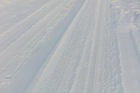 Snowy path with clear, parallel tracks Stock Photos