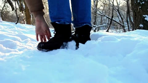 Snowy path with trees in the background Stock Footage 304431422