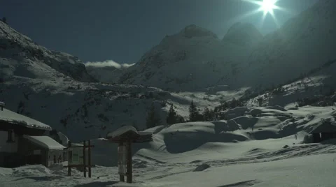 Snowy Peaks Mountain Hut Tracks Panning 4K Stock Footage 59776374