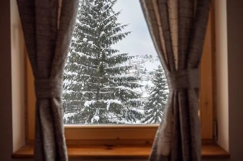 Snowy Pine Trees Through Chalet Window Stock Photos