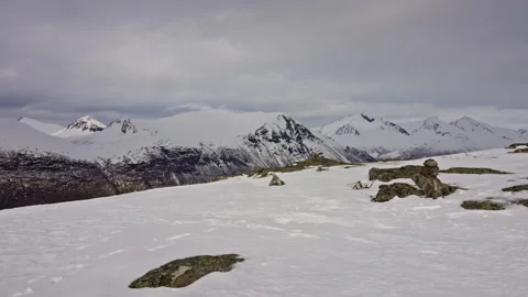Snowy plains with mountains in the background Stock Footage 267689157