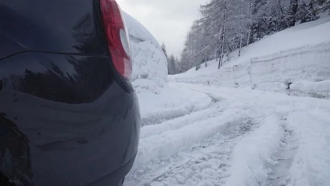 Snowy road behind a suv Stock Footage 103222654