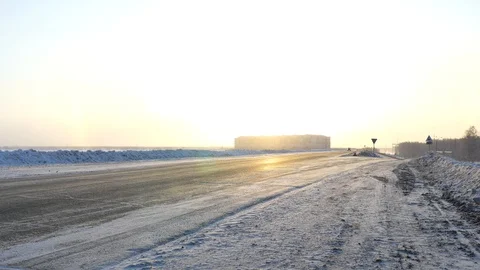 Snowy road at dawn Stock Footage 87929367