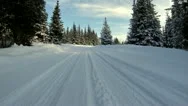 Snowy Road Driving Pov - Corner - Low Angle Stock Footage