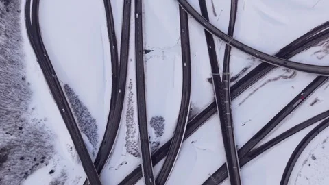 Snowy road network geometry aerial winter infrastructure pattern Stock Footage 328963161