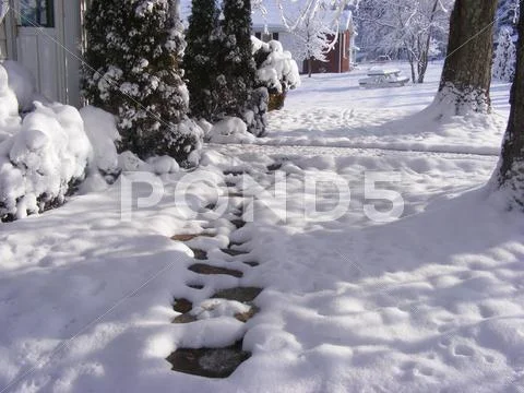 Snowy rock path Stock Photos
