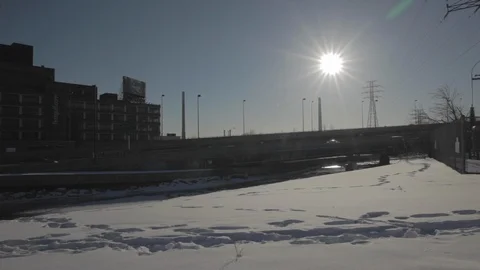 Snowy Setting with Industrial Backdrop Stock Footage 114021647